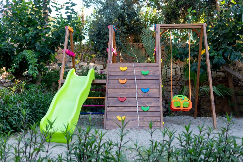 swing set and playset assembly